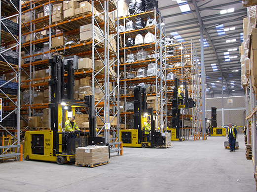 Very narrow aisle lift trucks in a warehouse